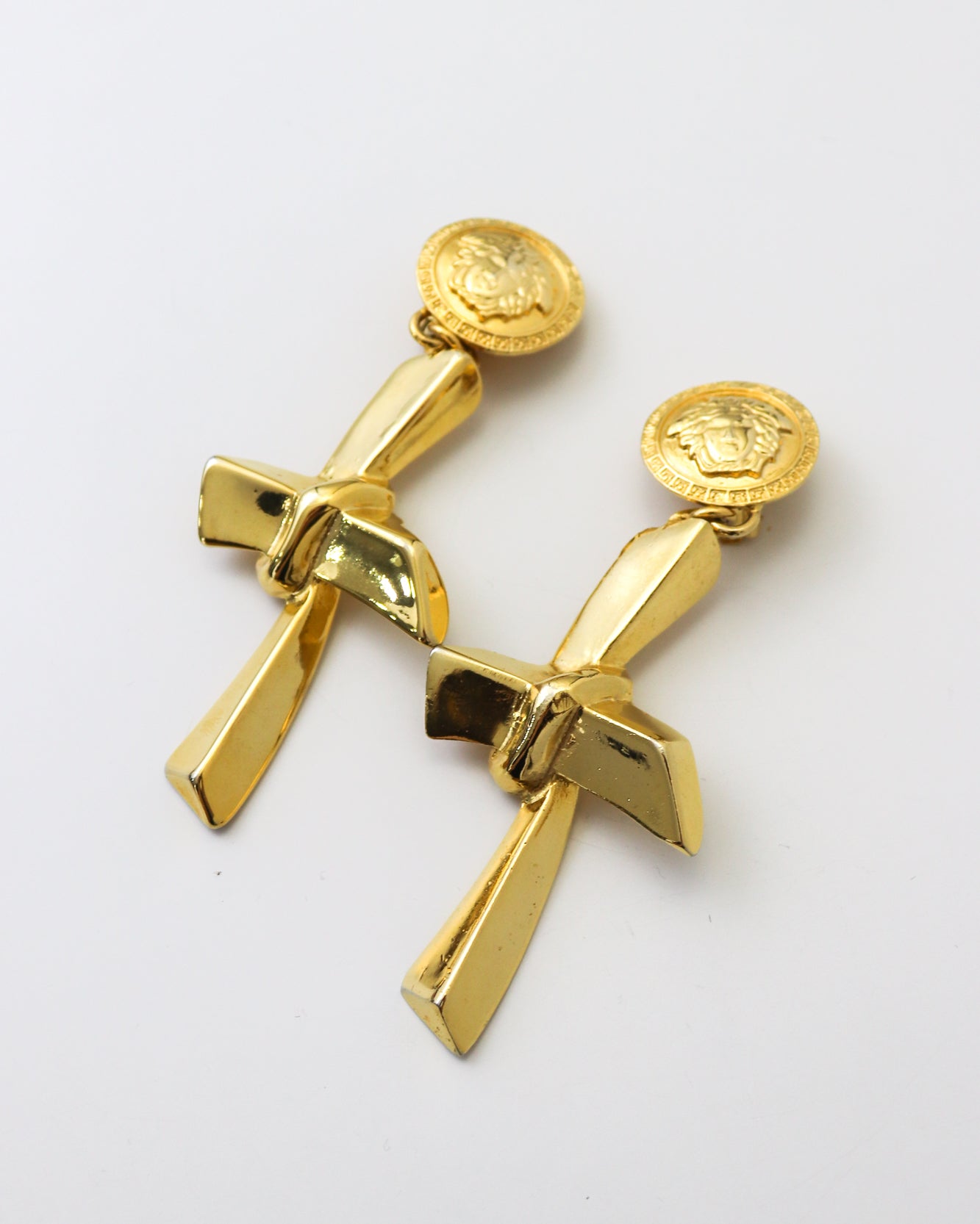 Vintage 1990s Gianni Versace Gold Medusa Head Knot Cross Earrings