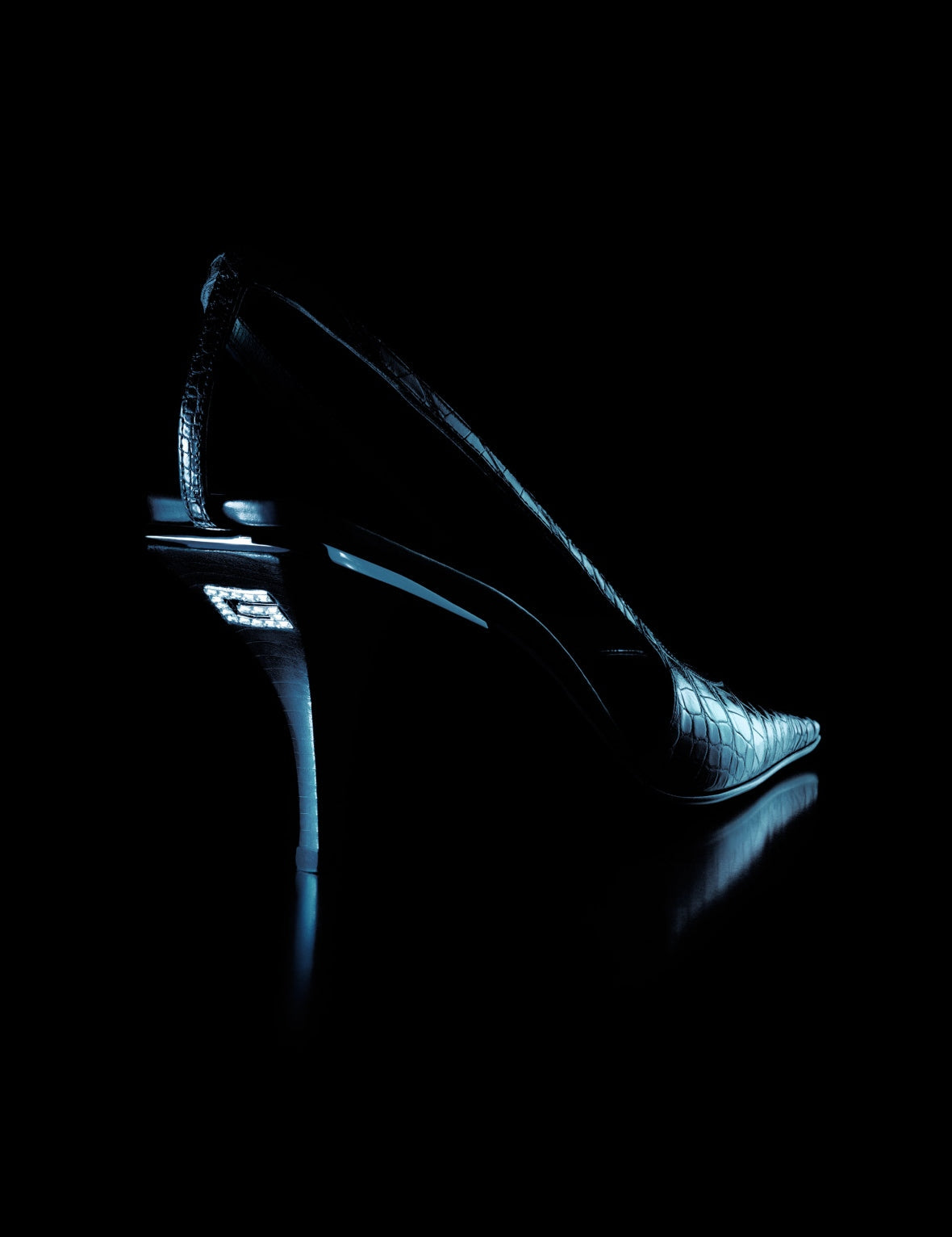 A pair of Spring/Summer 1998 Gucci Black Satin Slingback Heels crystal G letter photo from the campaign