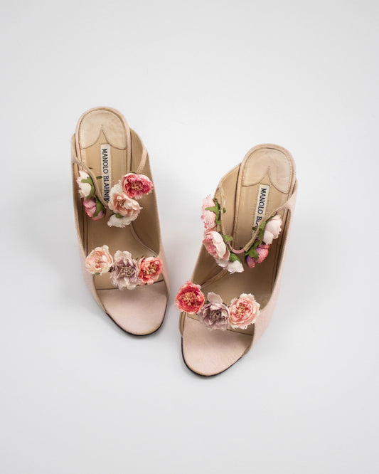 Pink Manolo Blahnik sandals with floral decorations top view