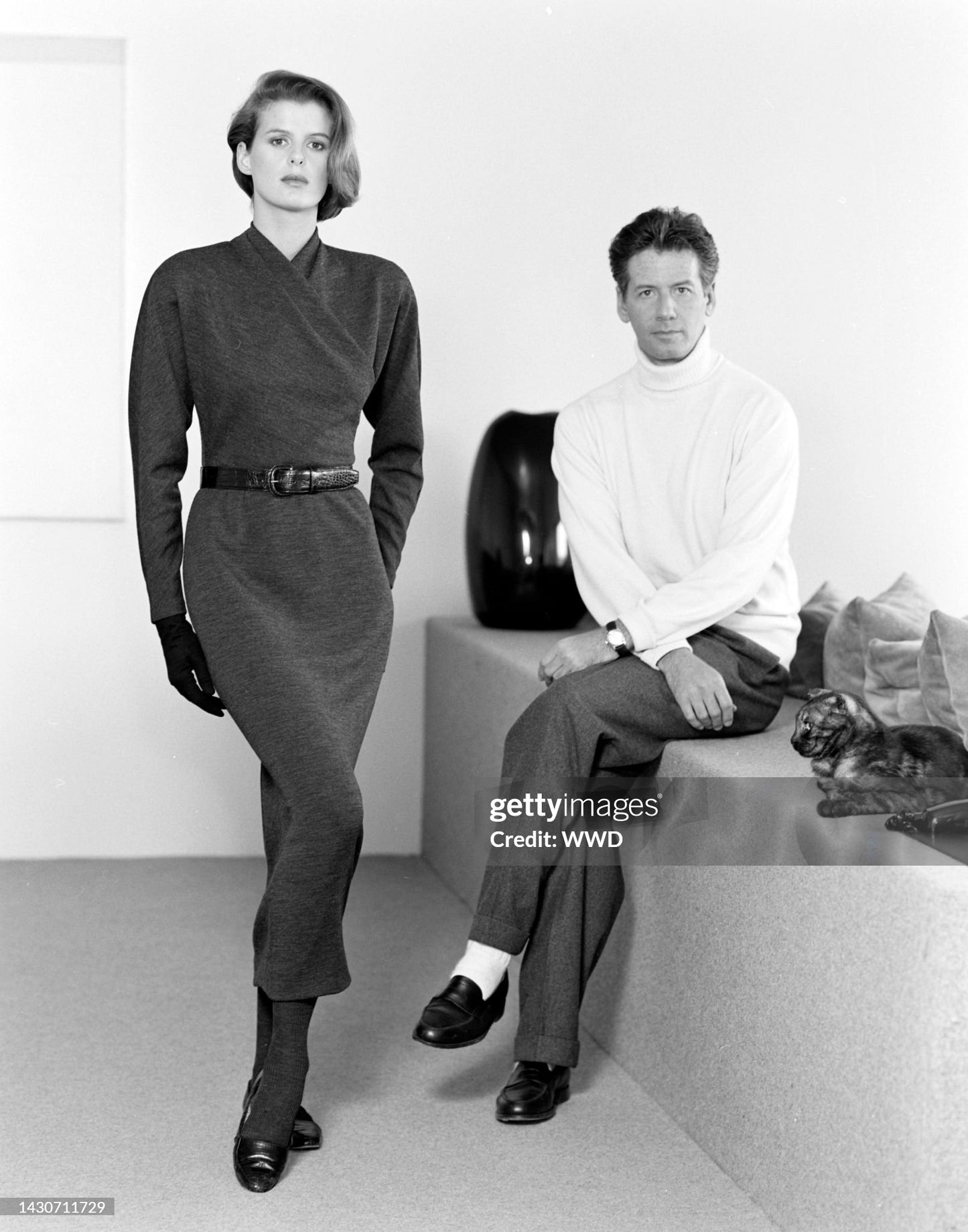 Josie Borain wearing Fall/Winter 1986 runway dress alonside designer Calvin Klein