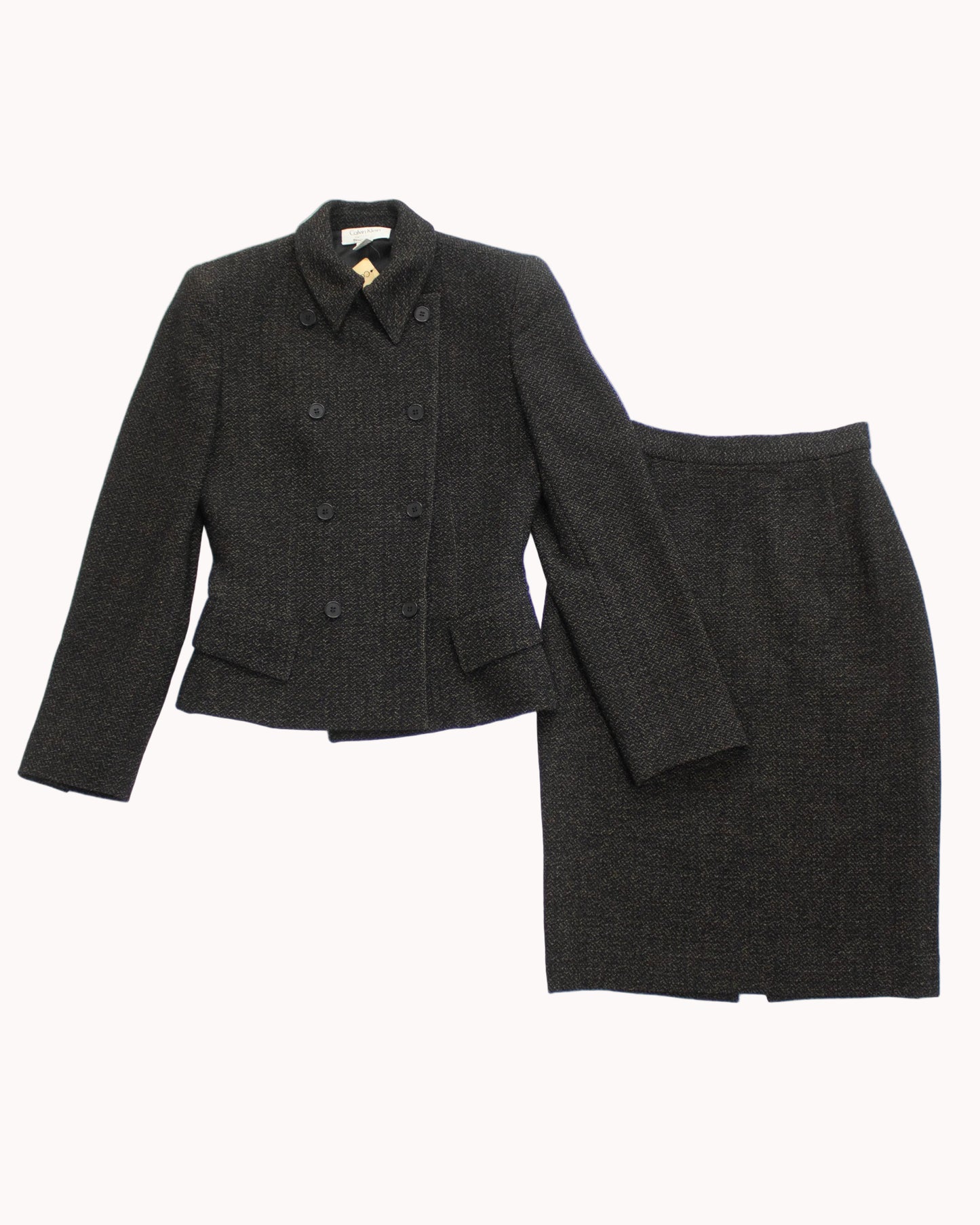 Gray suit jacket and skirt set on a light gray background