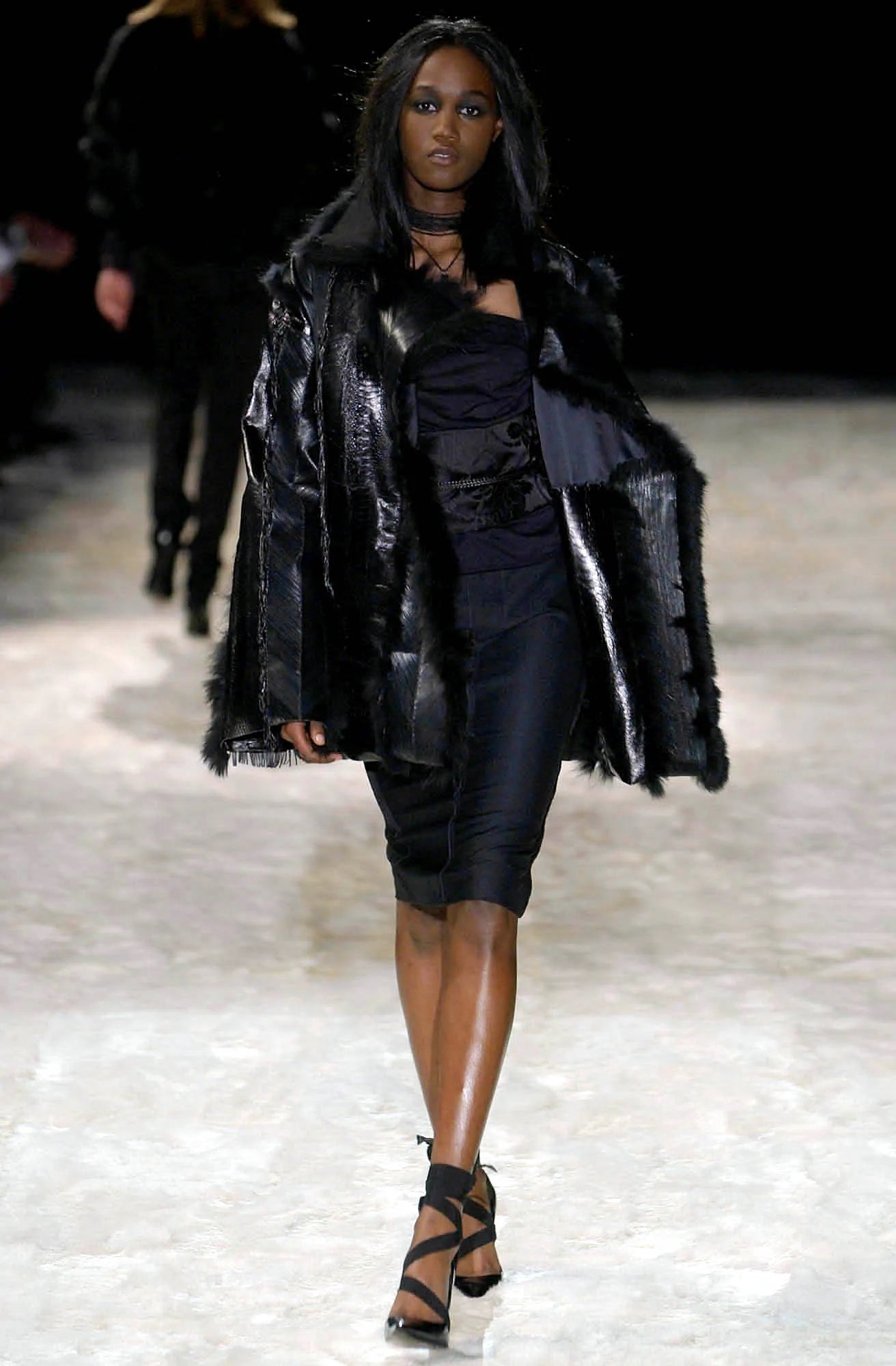 Pair of black pointed-toe Gucci heels with straps runway photo
