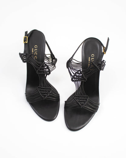 Black strappy high-heeled Gucci sandals front view