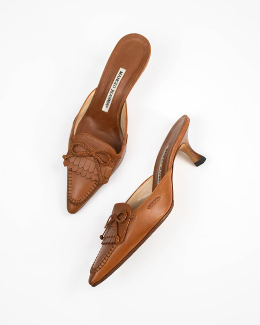 Manolo Blahnik fringed mules with bow detail side view 