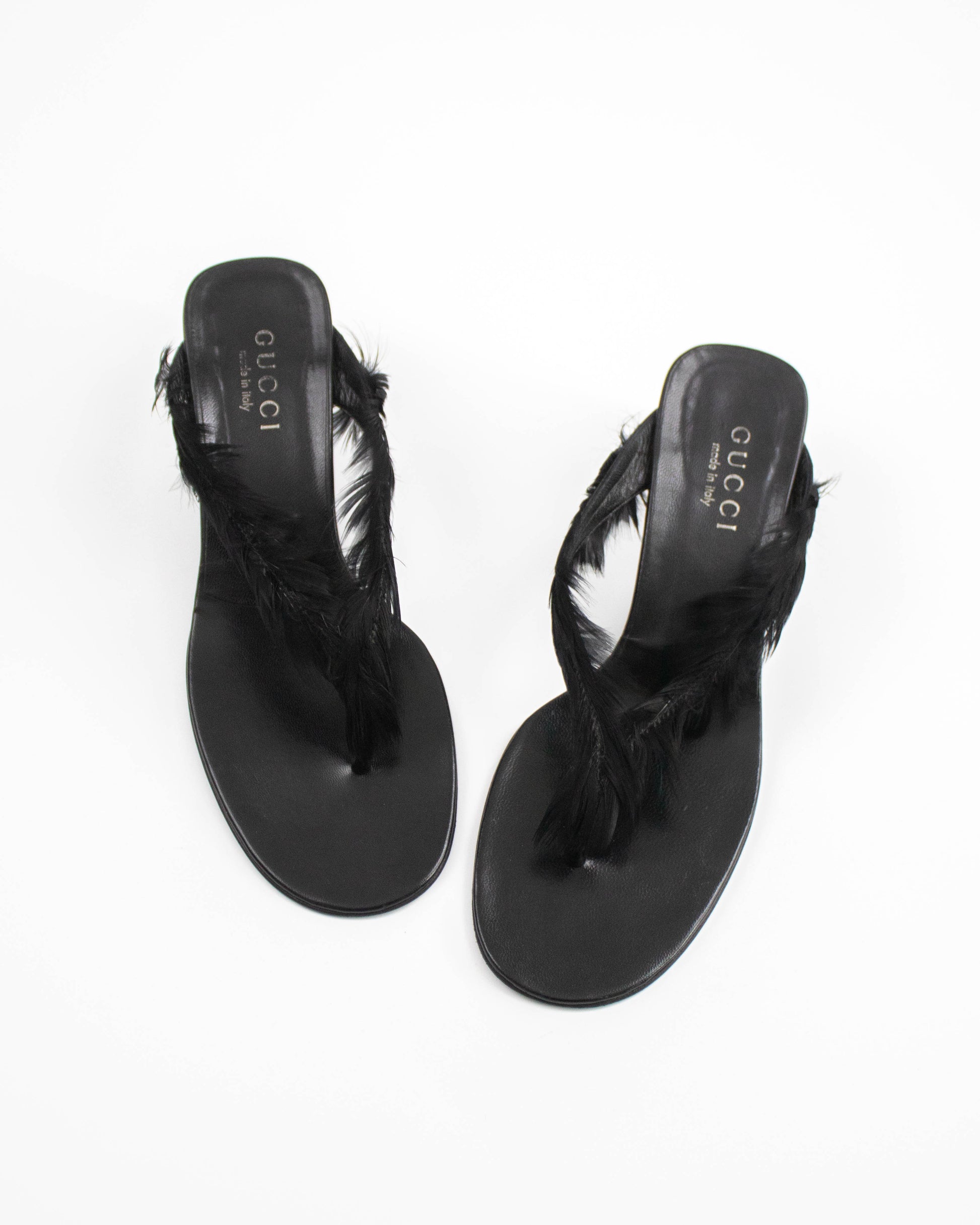 Black Gucci sandals with feather details front view