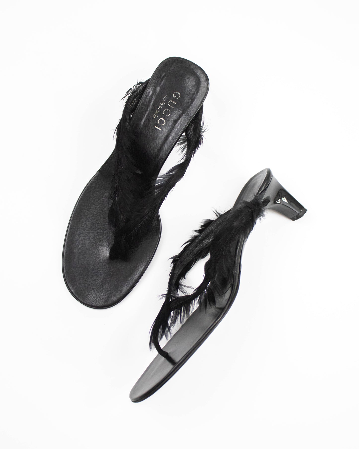 Black Gucci sandals with feather details side view