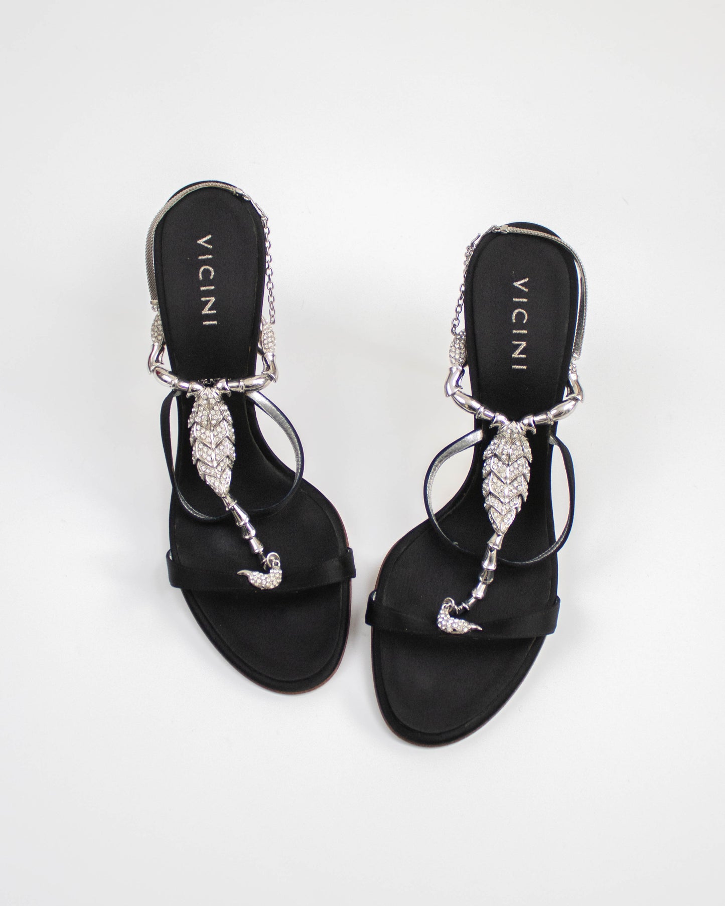 Vicini Giuseppe Zanotti Black sandals with decorative straps and scorpion charms top view