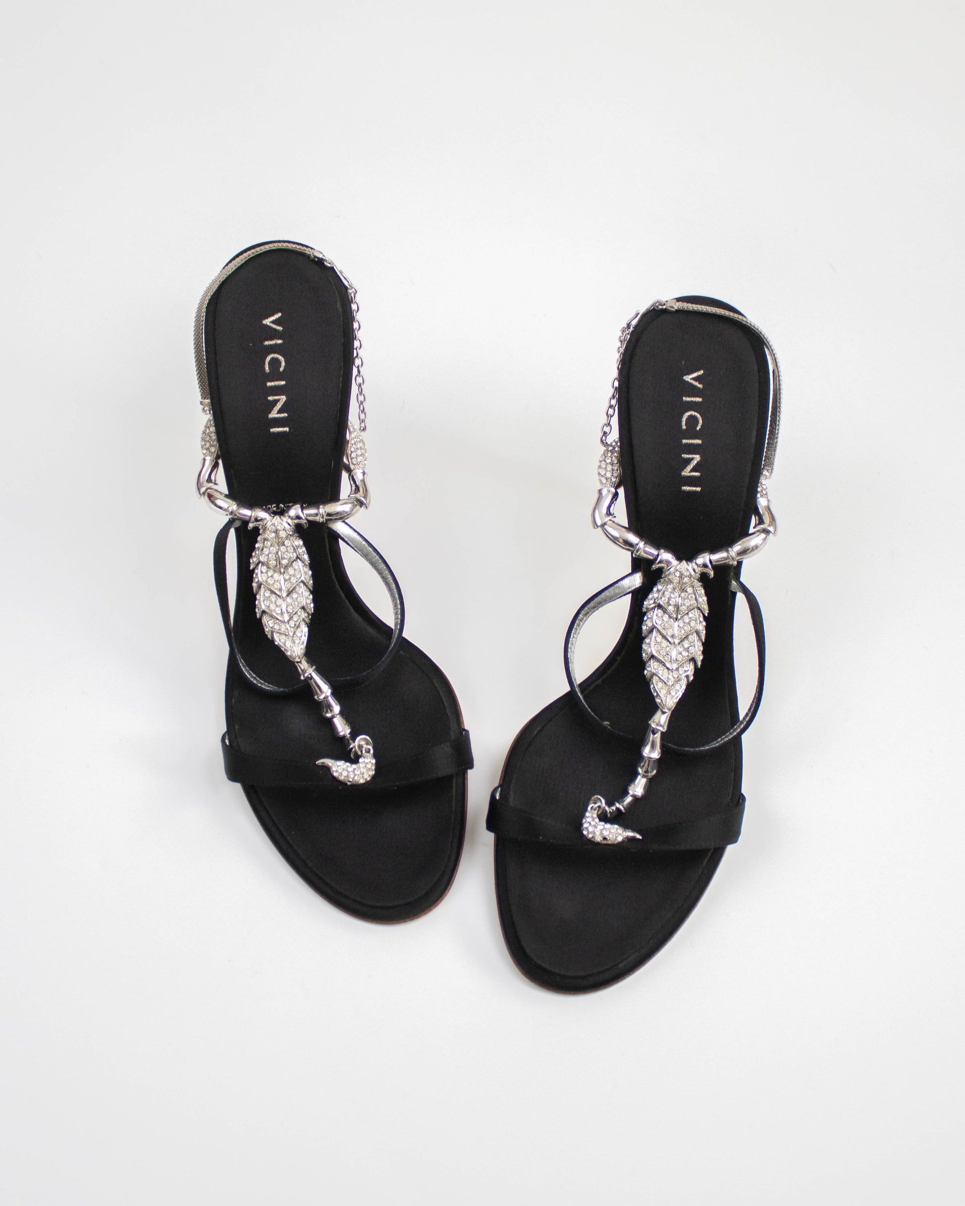 Vicini Giuseppe Zanotti Black sandals with decorative straps and scorpion charms top view
