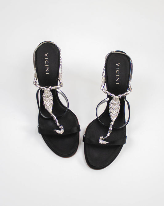 Vicini Giuseppe Zanotti Black sandals with decorative straps and scorpion charms top view