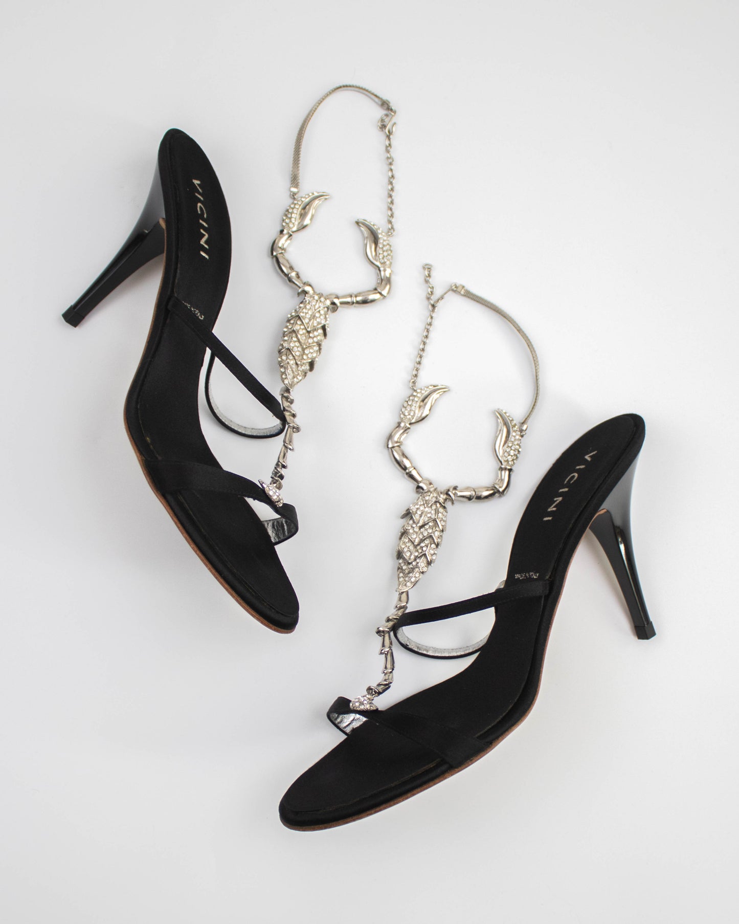 Vicini Giuseppe Zanotti Black sandals with decorative straps and scorpion charms side view