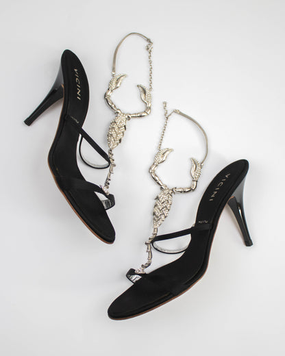 Vicini Giuseppe Zanotti Black sandals with decorative straps and scorpion charms side view